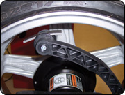 Inner Auto-Assist Data Input Arm also places tape weights behind spokes or on inner edge of wheel